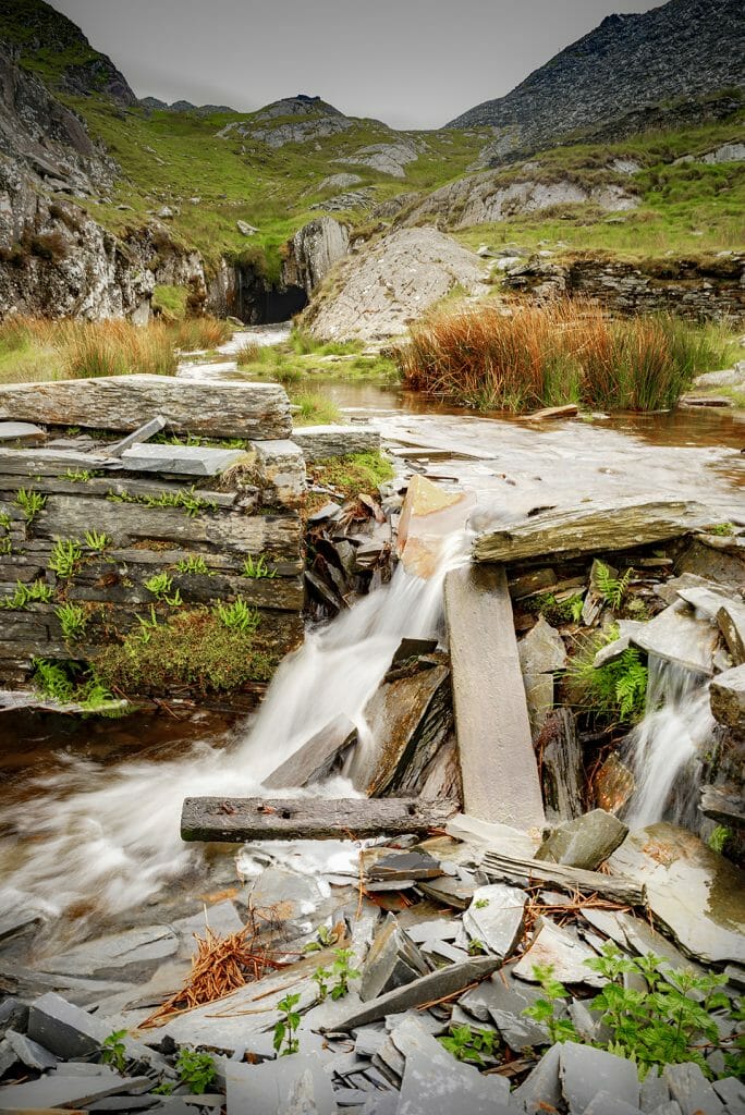 Walking with Your Camera Photographic Workshop from Welshot and Team Leader Helen Iles - Photo is of slate and running water in the Cwmorthin area of the the Snowdonia National Park