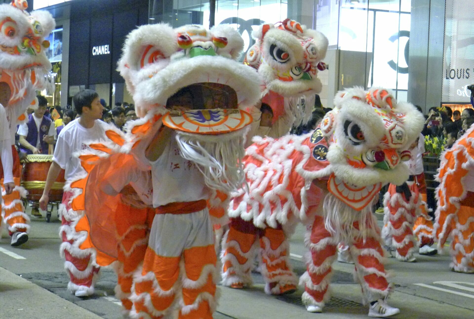 Street Photography Meets Chinese New Year - Manchester - Photo of a Chinese Dragon parading about the streets